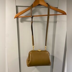 Tory Burch warm camel colored with purple interior Leather Crossbody Bag
